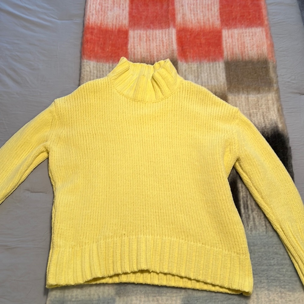 Bright yellow sweater